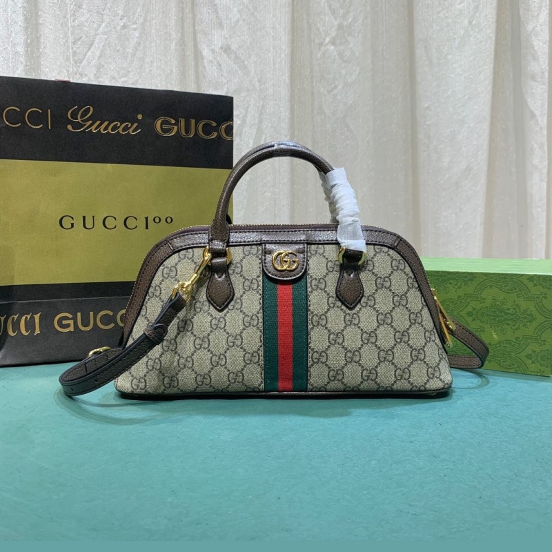 G*u*i top handle bags